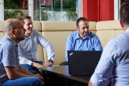 kamasys sales team at a meeting